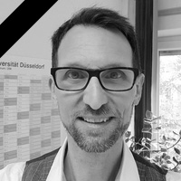 Das Profilbild von Erik Reidt (mit Trauerflor).